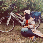 Woman romantic pose with Pedego ebike.