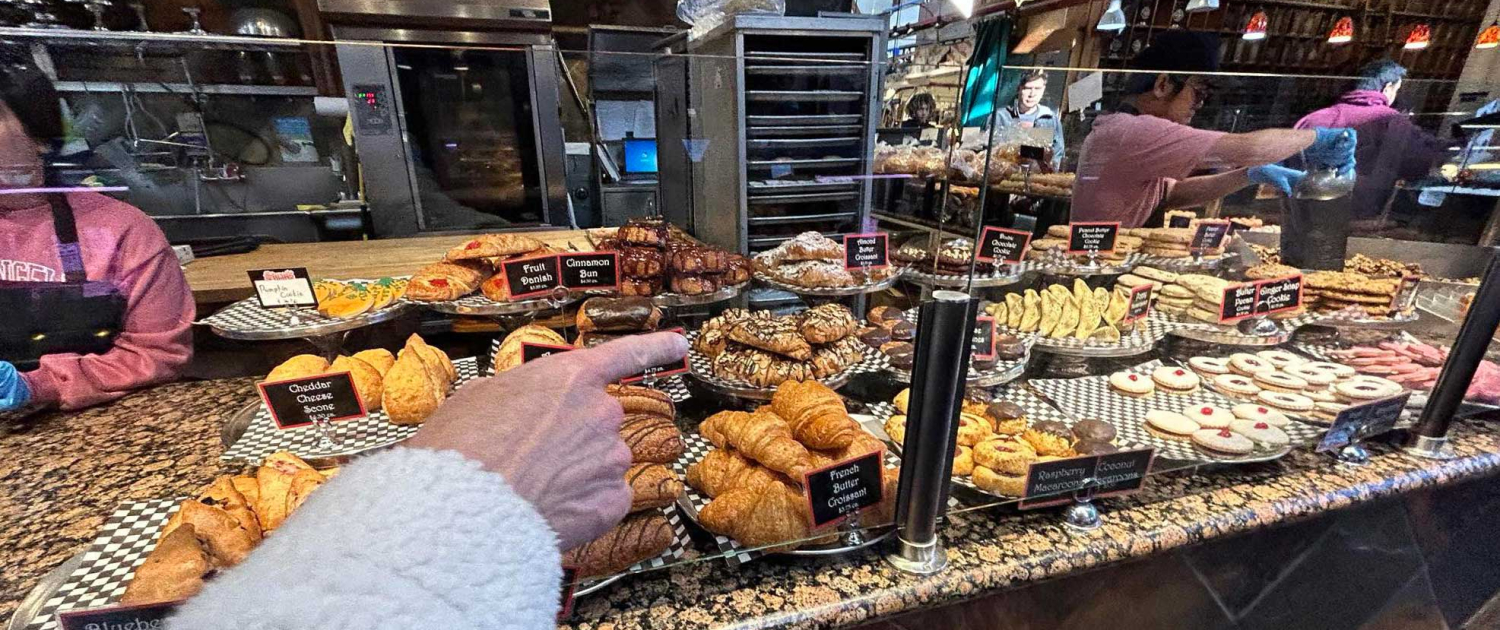 A selection of pastries in a display at granville island market vancouver